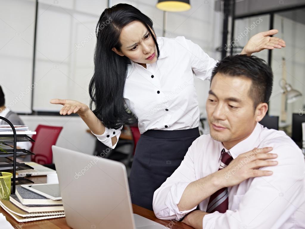 baffled asian businesswoman