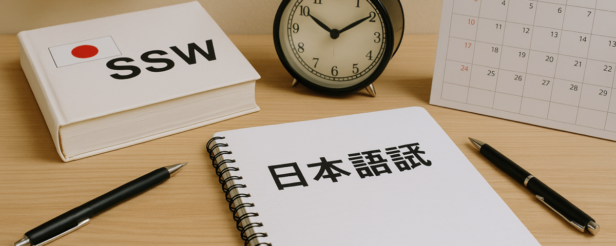 Foto realistik suasana meja belajar ujian bahasa Jepang SSW tahun 2025, menampilkan buku SSW berlambang bendera Jepang, catatan bertuliskan “日本語試験”, kalender dengan tanggal yang ditandai, jam klasik, bolpoin, dan sensu merah sebagai aksen—menggambarkan persiapan jadwal ujian bahasa Jepang SSW secara unik tanpa kehadiran manusia.