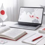 Pelajar Jepang Asia Tenggara belajar lewat materi bahasa Jepang dan perangkat kerja modern di ruang kelas minimalis—gambaran tren kompetensi Jepang untuk dunia kerja.
